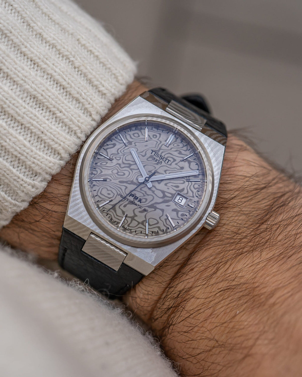 Hands-on: Tissot PRX Powermatic 80 – Nytt liv i 38 mm med titan och Damascus-stål