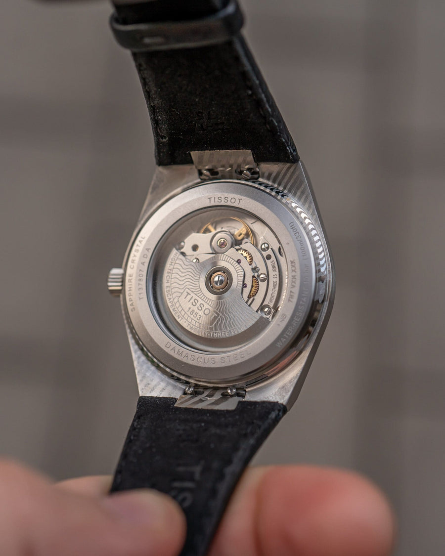 Hands-on: Tissot PRX Powermatic 80 – Nytt liv i 38 mm med titan och Damascus-stål