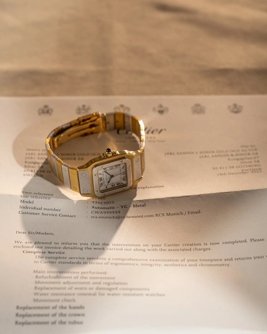 alt="Cartier Santos Carrée Deux Ors – 18k vit & gul"