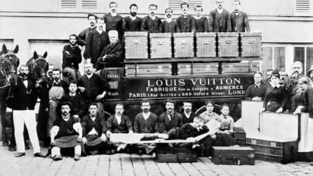 Louis, Georges and Gaston-Louis Vuitton poserar med anställda ca 1888.