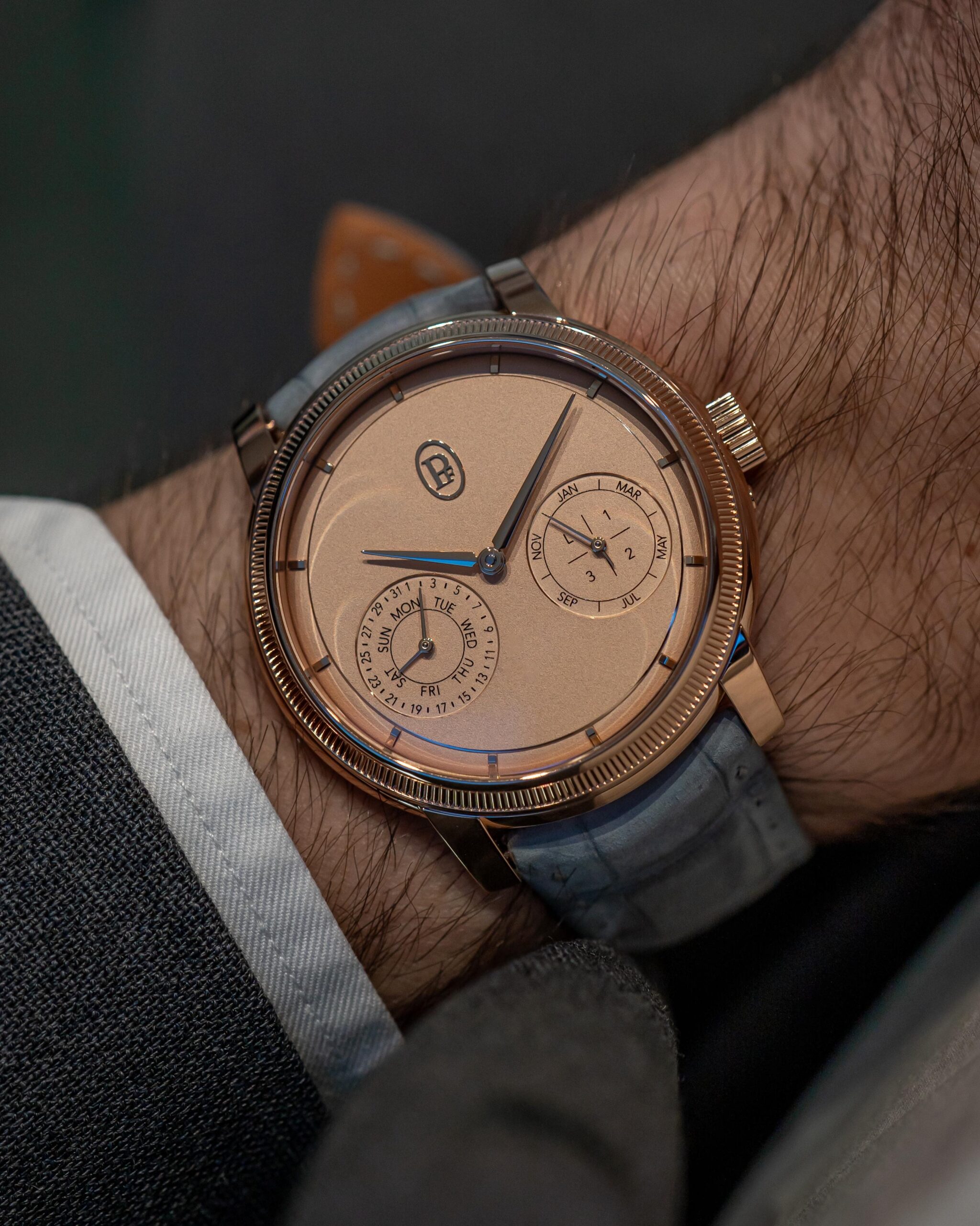 Parmigiani Fleurier gold watch on wrist