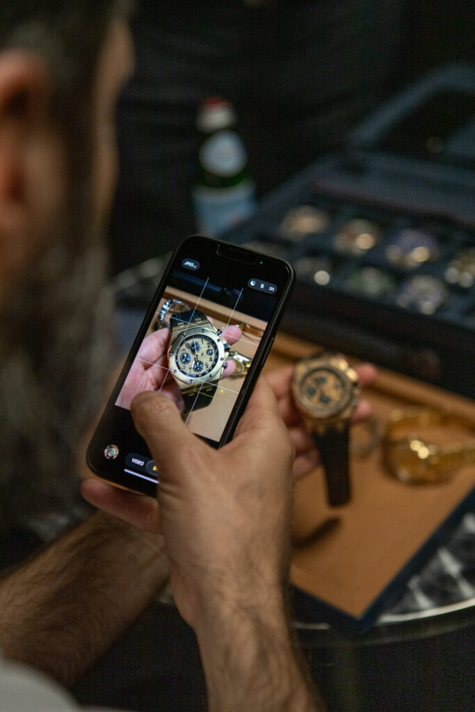 Meta pic of person taking a photo of a Audemars Piguet Watch